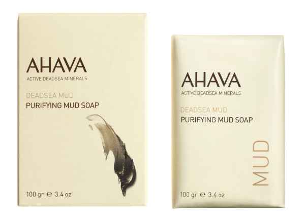 AHAVA Dead Sea Mud Seife, 100g, Verpackung und Seifenstück nebeneinander.