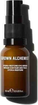 Braunes Fläschchen Grown Alchemist Hydra-Restore Eye Serum, 15 ml, mit schwarzem Pumpverschluss.