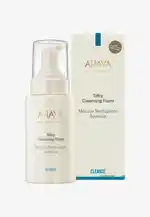 AHAVA Silky Cleansing Foam in weißer Flasche mit Spender und passender Verpackung im Hintergrund.