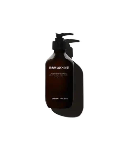 Grown Alchemist Hydra-Restore Conditioner, 300ml, braune Flasche mit Pumpspender, vor weißem Hintergrund.