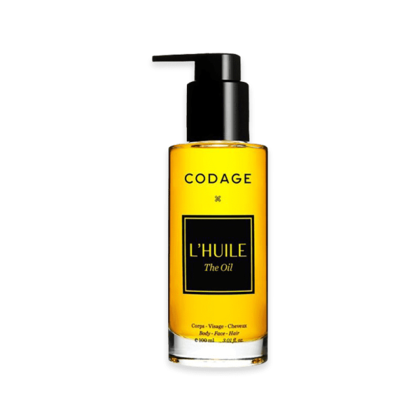 Codage Paris L'Huile The Oil, 100 ml Flasche mit schwarzem Pumpverschluss auf transparentem Hintergrund.